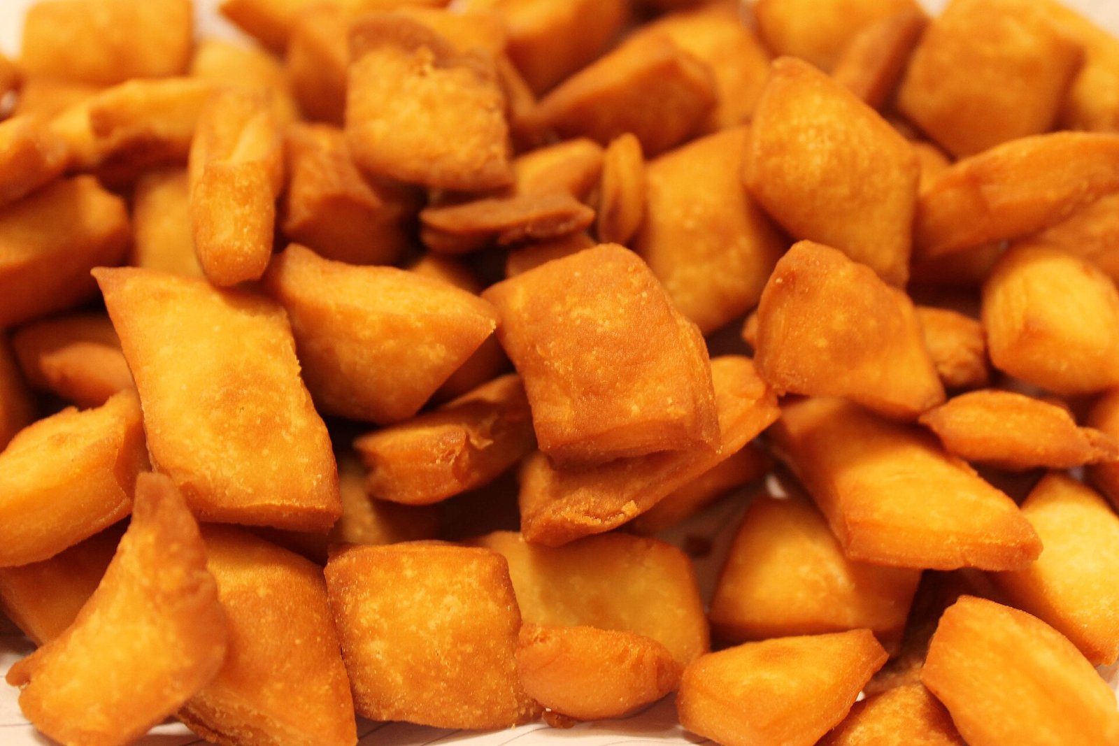 Diamond-cut sweet shankarpali stacked in a bowl